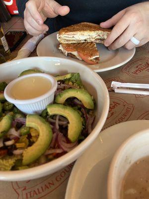 Salad with quinoa and avocado and la contolette(?) panini