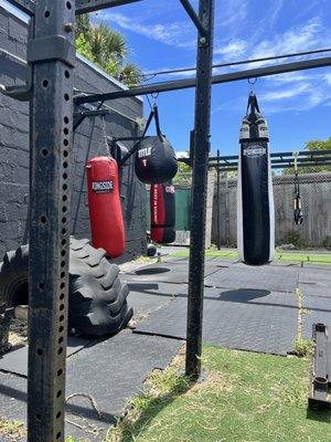 Outside gym area with punching bags