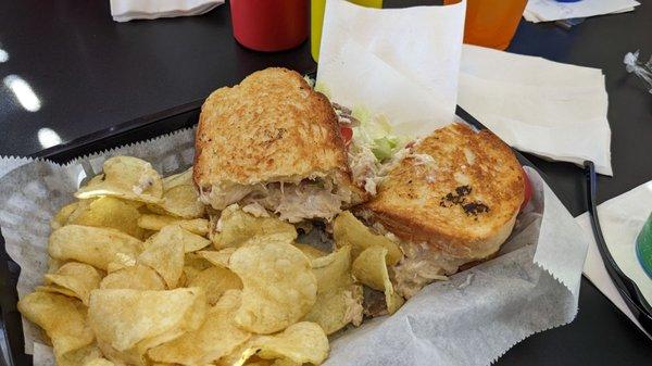 Chicken Salad panini with side of chips.