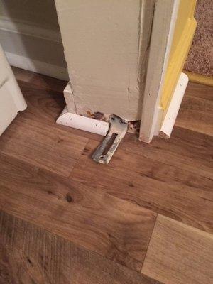 Baseboard incomplete on other side of laundry door