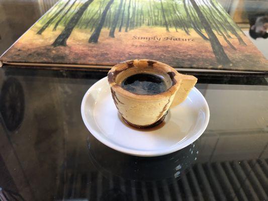 Double shot of espresso in a little biscotti cup!! Fun and delicious!! The watercolor book is by Mary, the owner!!