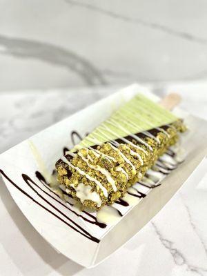 Pistachio - half dipped in dark chocolate, pistachios, & drizzled white chocolate. :P