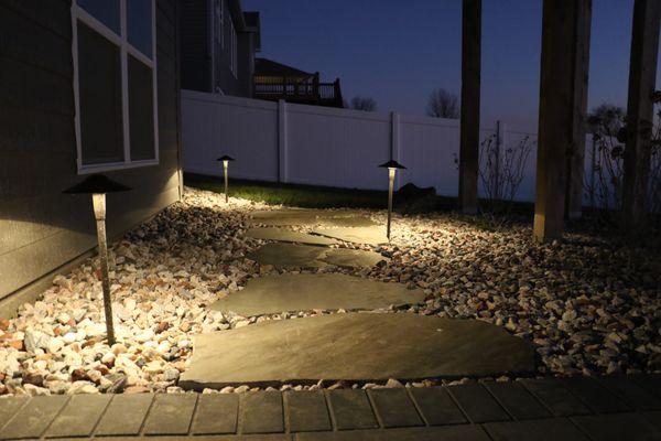 Landscaping lighting along paths can allow you to enjoy your outdoor living space, no matter the time of day.