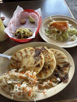 Huge Pupusas up front, a steak taco top left and Gordita in top right