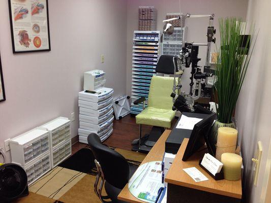 Exam room.  No more big scary black chair! Come in for your exam and feel right at home in your green chair!