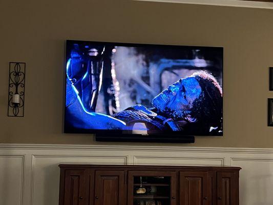 LG 83" tv and Sonos arc mounted.