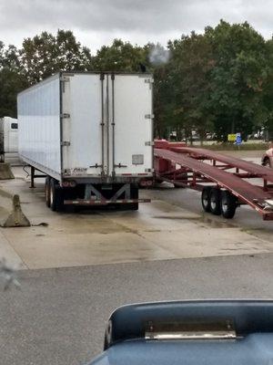 Trailer and car hauler - abandoned vehicles.