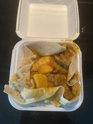 curry chicken in roti to go- I didn't like that it was onto, it made it messy and couldn't eat with sauce