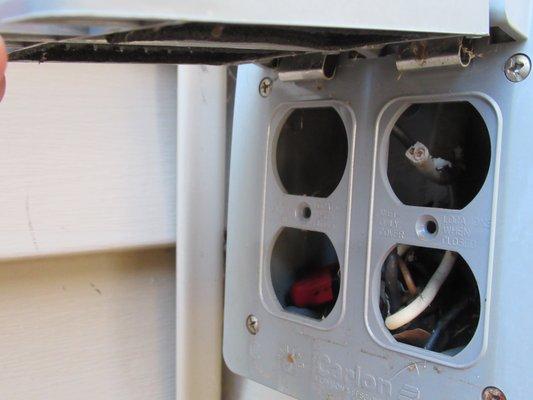 Live Wires found not capped on outside receptacle box