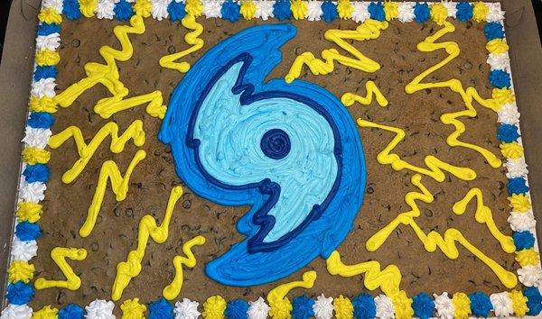 Hurricane Party - largest available cookie cake, blue hurricane with yellow icing