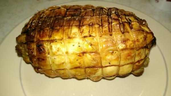 Whole stuffed chicken breast after cooking. Very good.