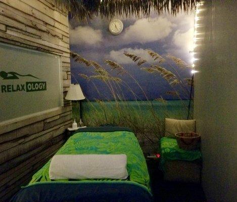 A cozy private cottage room & comfortable massage table.