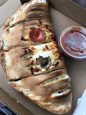 Custom Calzone, they top it with your toppings so you know what's in it! Mine was pepperoni and mushroom