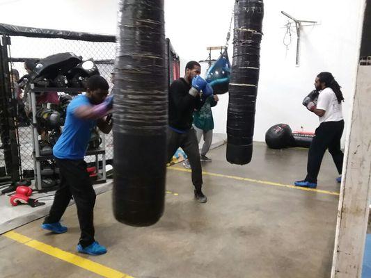 Boxing bag workout drill during training.