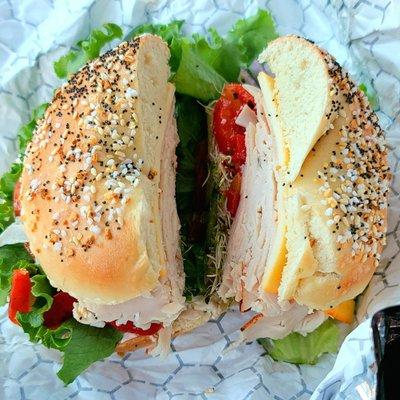 The Garden bagel sandwich: on everything bagel, add turkey and muenster