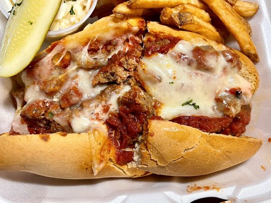 Meatball grinder on a fresh roll