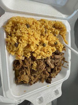 Arroz con gandules like abuela makes em and pernil so soft you ganna need a spoon to eat it