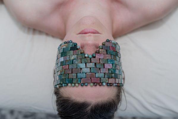 Rainbow fluorite mask to aid in lymphatic drainage as well as cool compression.