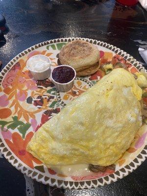 Vegetarian omelet with English muffin.