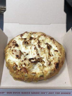 Chicken Alfredo pasta in a bread bowl