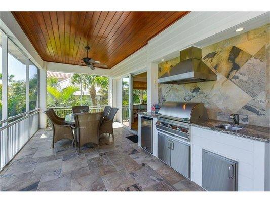 Three blocks to the beach on a "very private," quiet, sought after Street. 40 foot heated salt water pool and spa...