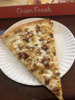 Chicken bacon ranch pizza slice