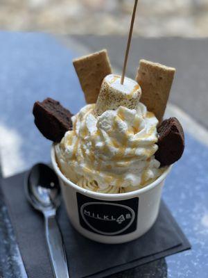 Campfire Rolled Ice Cream with vanilla ice cream (instead of chocolate) and caramel (instead of chocolate syrup).