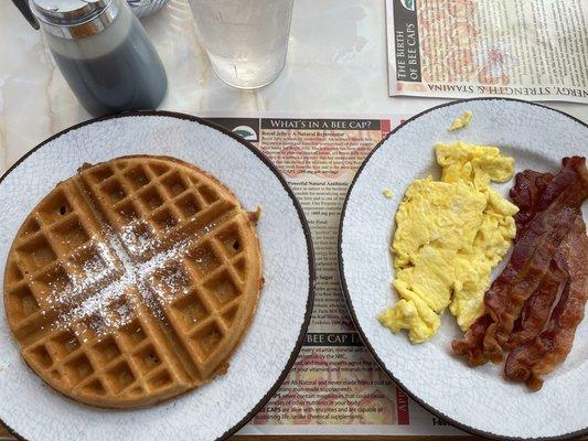 Belgian Waffle Special served with two eggs any style with bacon, sausage, or ham