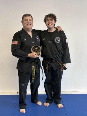 Myself and my Grandson on my promotion to 2nd Degree Black Belt.