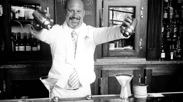 Bartender Rob making Glass Vodka Martinis at the Metropolitan Grill