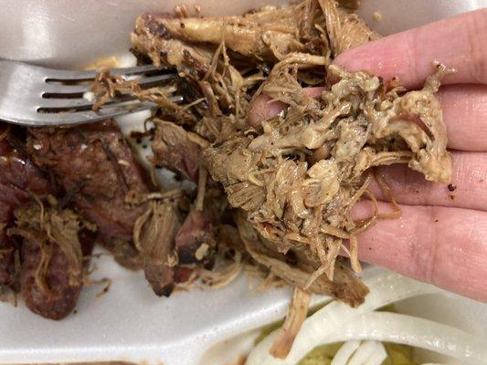 Big piece of pulled pork fat. I understand where it comes from, but they didn't seem to try to clean it at all.