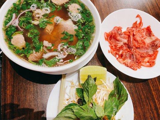 Large combo pho with rare ribeye on the side $11.75. Delicious!