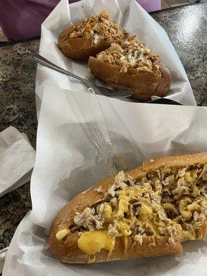 Mac n cheese Philly cheesesteak (chicken) and a buffalo chicken cheesesteak