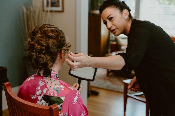 Pauline putting the finishing touches on my hair that lasted through a long, HOT, dance-filled wedding day (not pictured: beautiful makeup!)