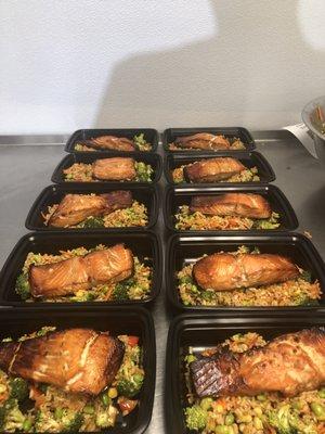 Teriyaki Salmon over house made fried rice and stir fry veggies.