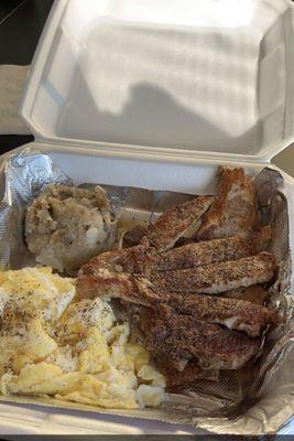 Small breakfast plate with grilled chops.