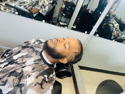 Mens braids with taper cut and beard line up