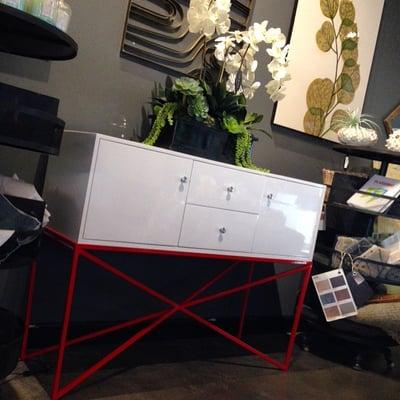 Our very own custom X Sideboard, available in a variety of lacquer finishes, and metal frame colors as well as chrome.