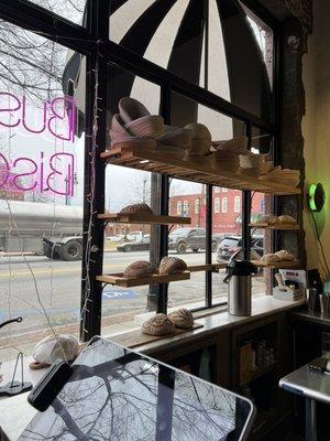 Sourdough loafs displayed in the front window.