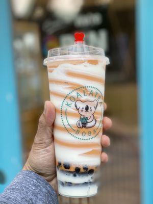 Thai Twister - Creamy Blended Thai Milk Tea with Cream Puff (added brown sugar boba).