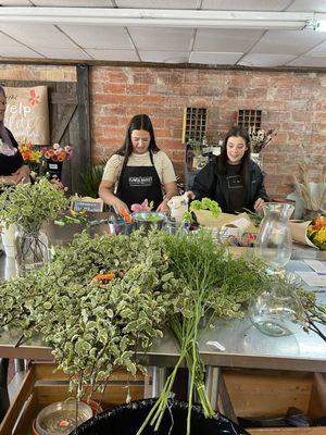 Ladies hard at work getting the flowers ready for our bouquets