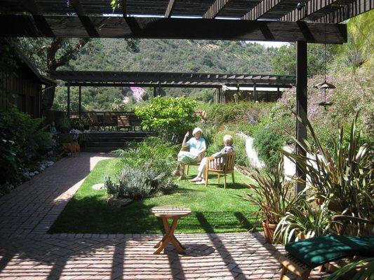 Bel Air Residence - This garden provides the user solitude with several locations in the sun and shade to enjoy the cooling sound of water.