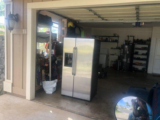 My refrigerator quietly waiting at first for repairs then relocation. 99 days waiting for service.