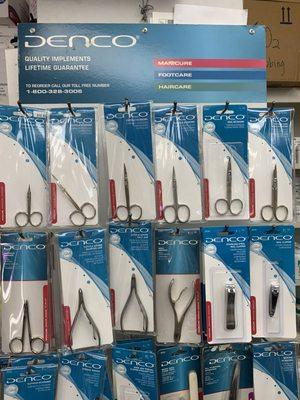 Full line of premium Denco implements including scissors, clippers, nippers and tweezers.