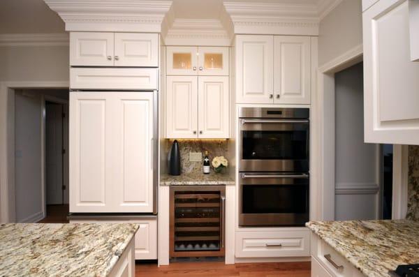 Photo of a kitchen we shot last week. The full-height backsplash looks beautiful!