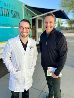 Dr. Carsten R. Hamann volunteering to give free skin checks.