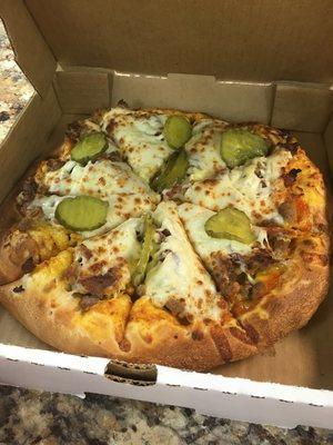 Try one of our specialty pizzas 
 This is our cheeseburger pizza 
 Try one it might make your day