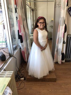 Beautiful little princess in her white dress. After took out some layers and shortened, the dress is perfect fit with her:)