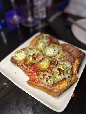 ULTIMATE PEPPERONI SQUARE $27 tomato, house mozzarella, 'nduja, sicilian oregano, ezzo pepperoni, pickled chile, honey