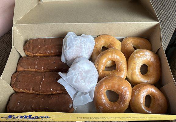 Chocolate Iced LaMar Bar, Ray's Original Glazed Donut, Bavarian Creme Filled Bizmark, Raspberry filled powdered sugar donut.